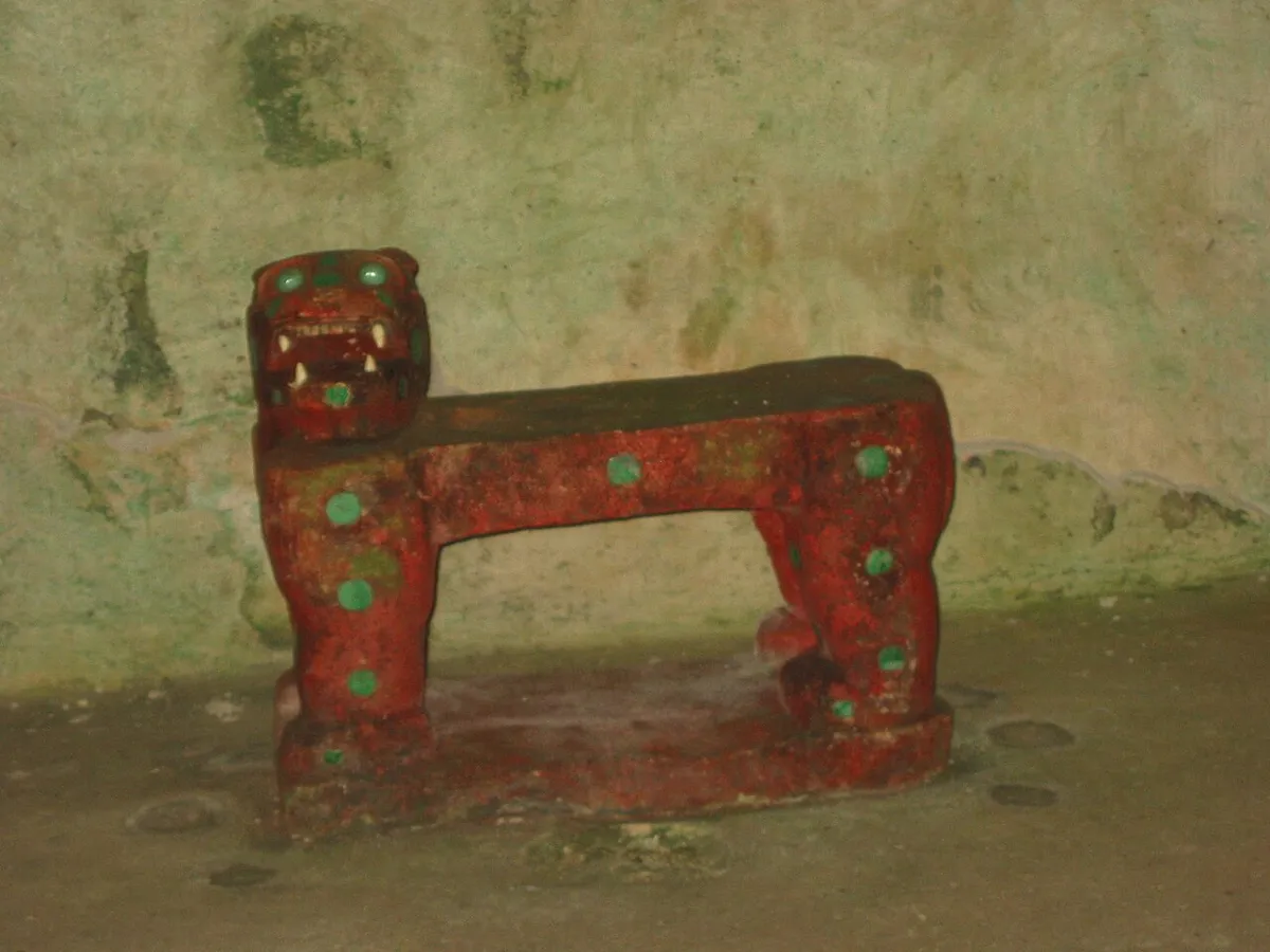 Red jaguar throne inside El Castillo included in Chichen Itza ticket price history, Yucatan, Mexico