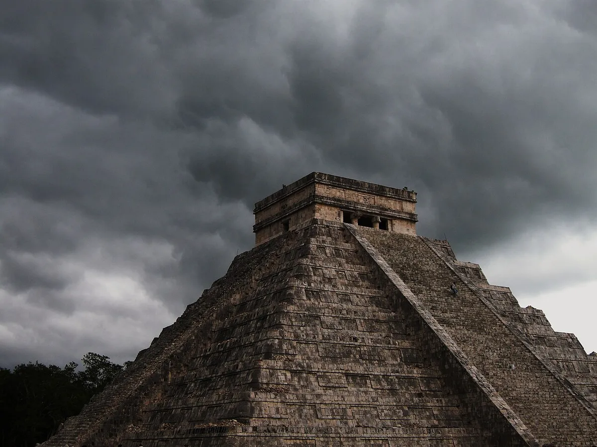 Storm clouds over Chichen Itza during the green season, a factor in the best time to visit, Yucatan, Mexico